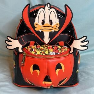 Loungefly x Disney Donald Duck Vampire Glow in the Dark Halloween Backpack